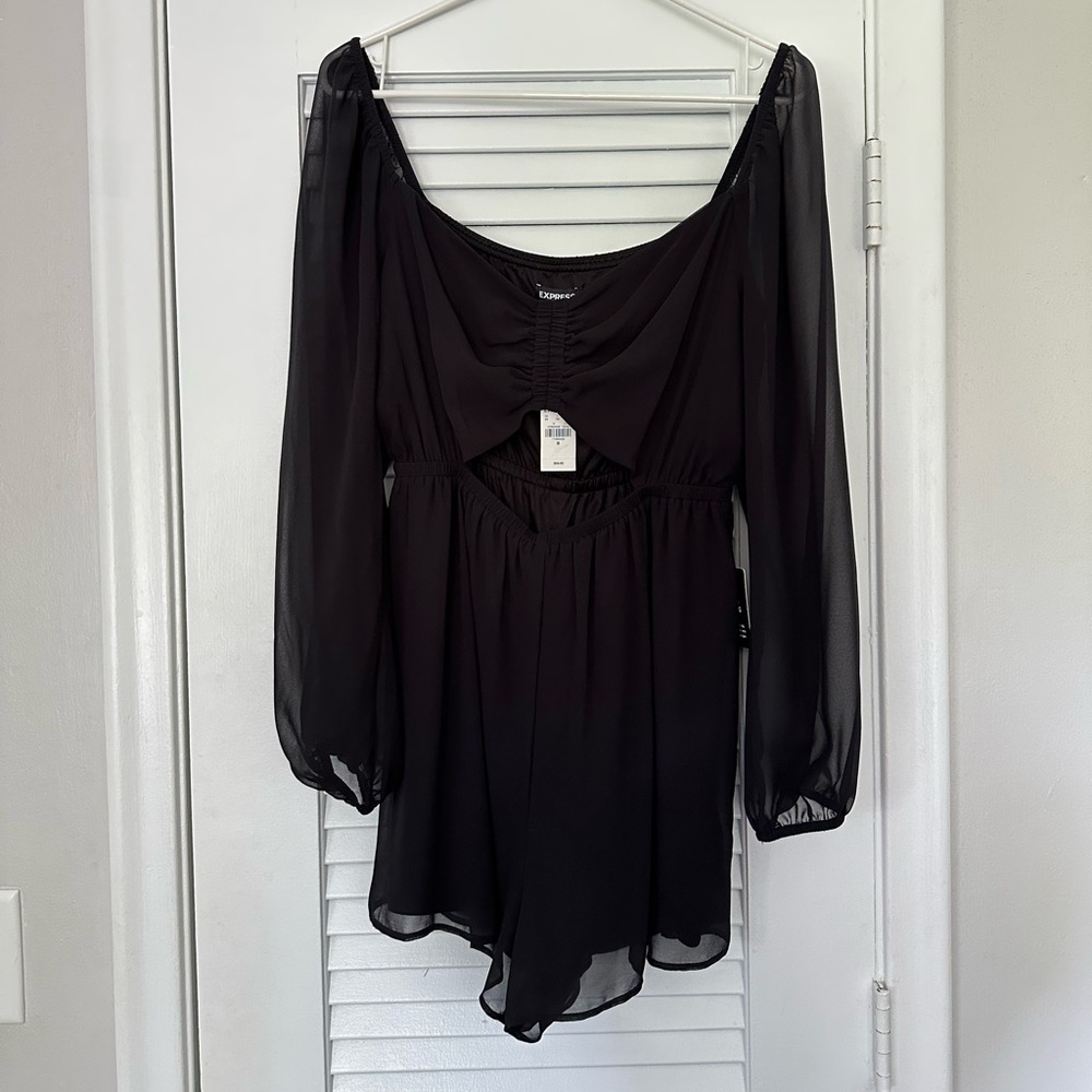 NWT Express Romper with cutout and sheer sleeves size medium.